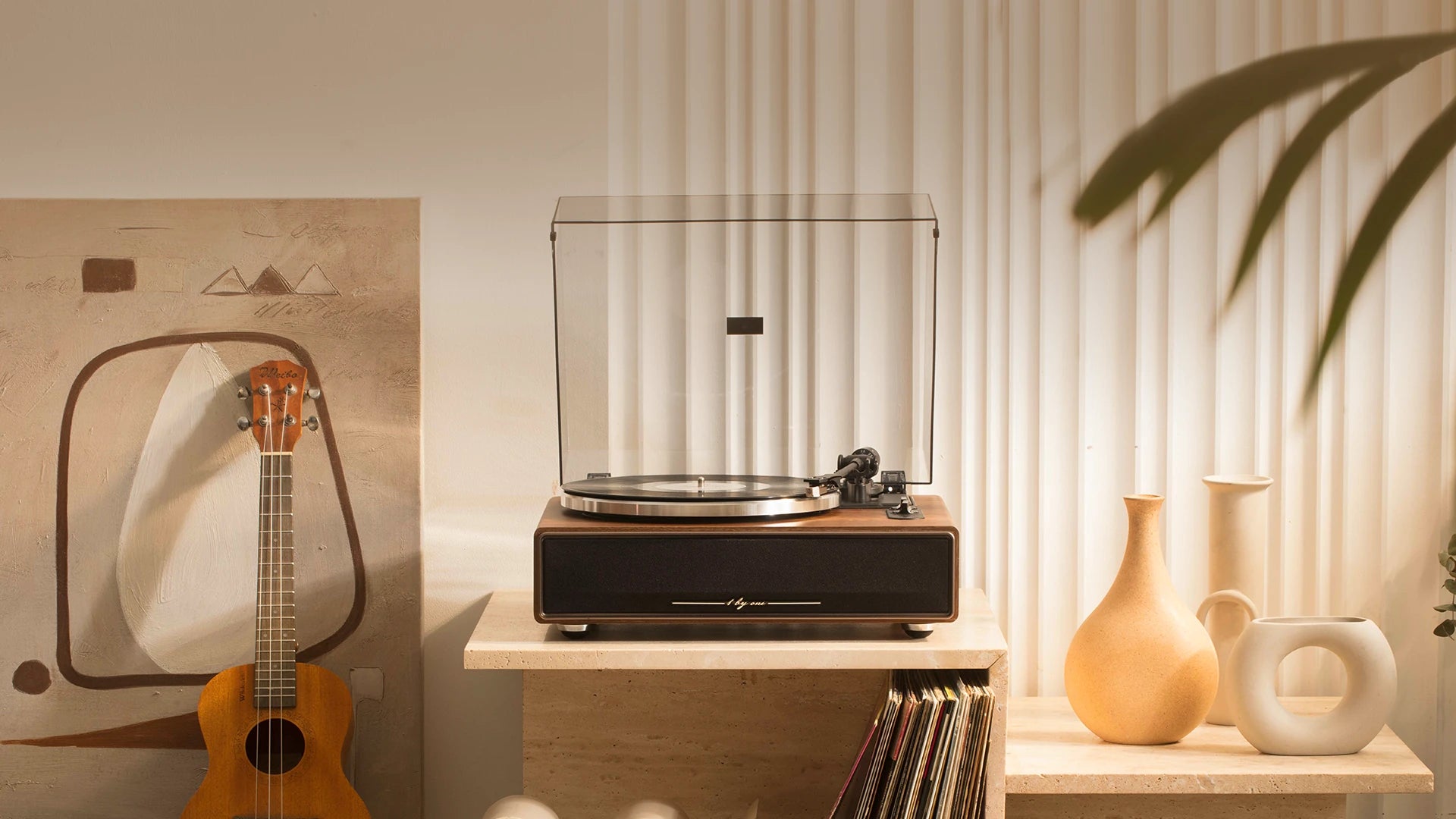 Minimalist room showcasing an all in one record player, delivering an immersive record player with built-in speakers sound.