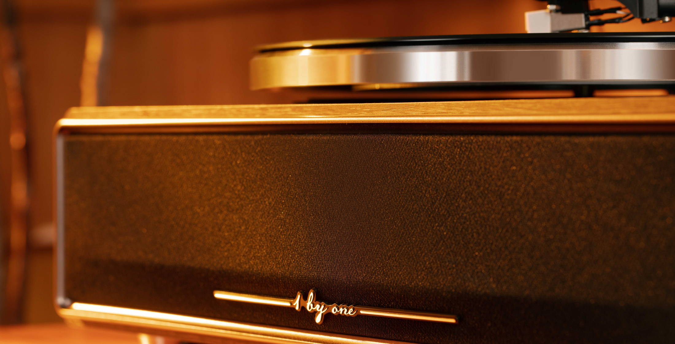 Close-up of premium record player speakers on a wooden record player, delivering an immersive high fidelity sound.
